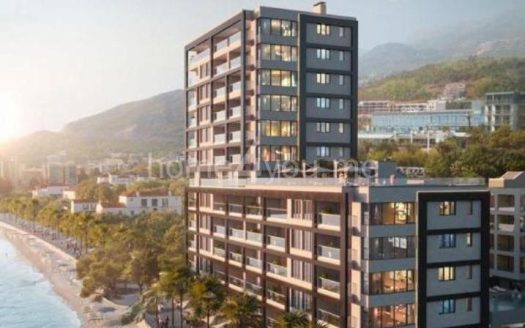 Luxurious two-bedroom apartment on the first line of the sea with a garage, complex Sunraf, Rafailovići
