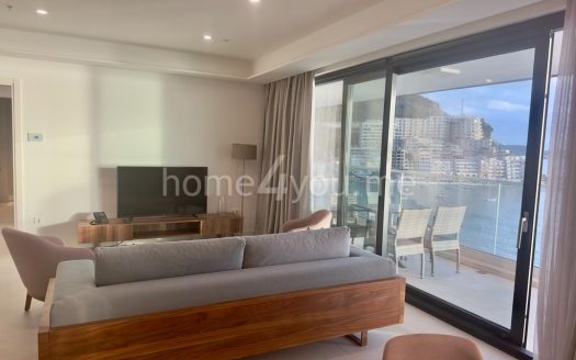 Luxurious two-bedroom apartment on the first line of the sea with a garage, complex Sunraf, Rafailovići