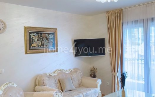 Two-bedroom furnished apartment with garage space in an excellent location, Gospoština, Budva