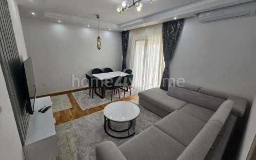 Furnished two-bedroom apartment with a spacious terrace and double garage, Bečići,Budva