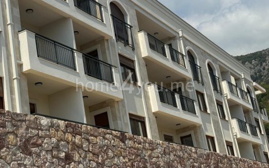 Two-bedroom apartment with garage parking space in a new luxury residential complex, Dubovica, Budva